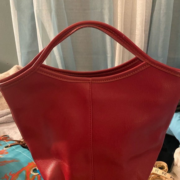 Red hand bag that is adorable.  Made from leather like material. - Picture 2 of 4